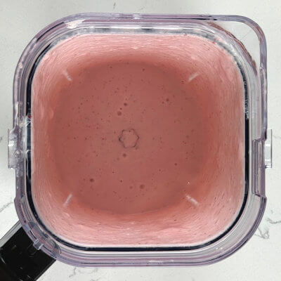 Step 2 - Transfer pieces of strawberry into a blender, together with the cream cheese, yogurt and sugar. Puree until smooth. Sprinkle the gelatin powder in a little bit of warm water and mix well. Add this to the blender and mix again.