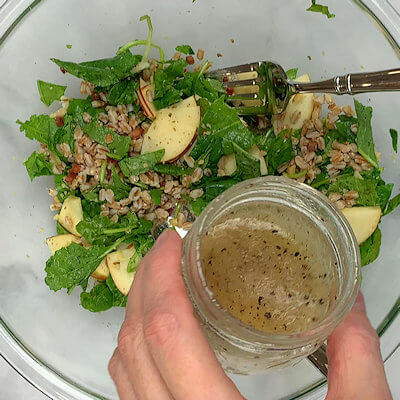 Step 5 - Mix oil, vinegar, mustard, honey, pepper and salt into a dressing, pour over the salad and mix again.