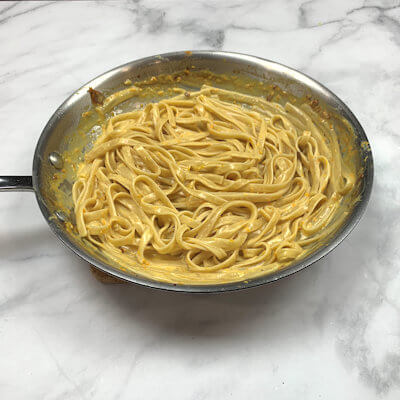 Step 3 - Drain pasta and reserve some pasta water (you'll never know if you need it).Add the pasta to the sauce and mix so the sauce coats the pasta. If you like the sauce thinner add some pasta water.