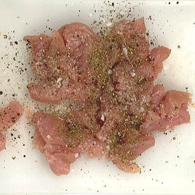 Step 2 - Cut the turkey in small strips and season with salt, pepper and oregano.