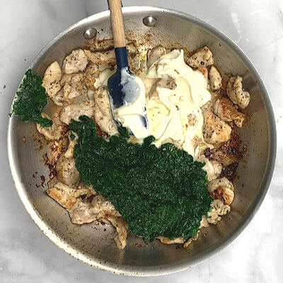 Step 5 - Add garlic, creme fraiche, spinach to the turkey and mix together.