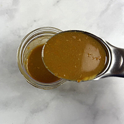 Step 1 - Mix all the ingredients for the glaze: Dijon mustard, maple syrup, balsamic vinegar and orange zest.