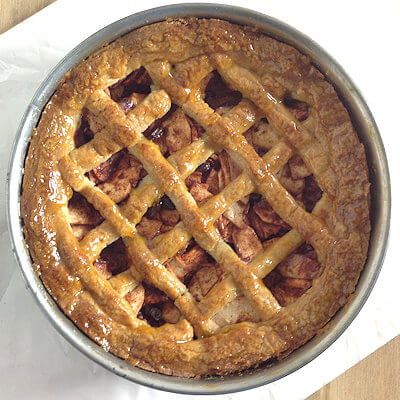 Step 8 - When the apple pie is done and comes out of the oven, brush the dough with apricot preserves for a beautiful shine.
