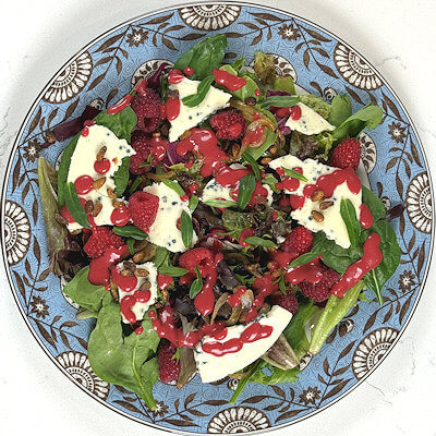 Step 6 - Last but not least; divide fresh tarragon over the salad. This herb makes the salad complete as it works very well with the raspberries.