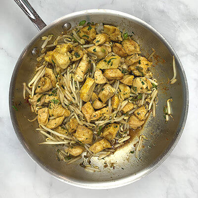 Step 4 - Add bean sprouts, sambal oelek and soy sauce and toss again until warm.