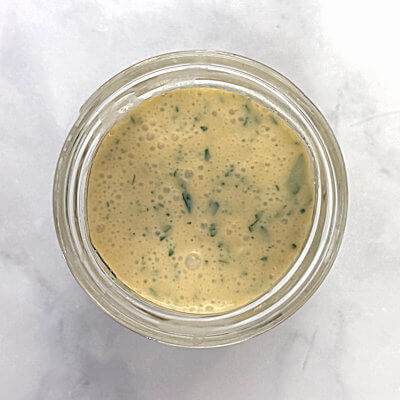 Step 3 - Mix the ingredients for the dressing (mustard, creme fraîche, lemon juice, honey, parsley, salt & pepper).