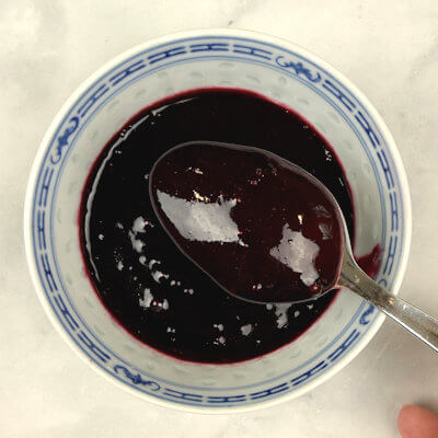 Step 2 - Transfer the blueberries to a food processor and puree. Pour blueberry puree through a sieve (above a bowl) and press out all the liquids. You'll end up with a perfectly smooth blueberry puree. Discard the sieve content. Cover bowl and refrigerate for 1-2 hours until puree is cold and slightly thicker.