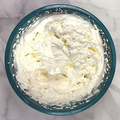 Step 3 - An unnecessary step to show you, but you for completeness: whip cream with sugar until soft peaks. 