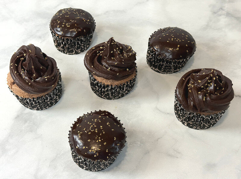 Mixed topping on chocolate angel food cupcakes