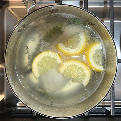 Step 1 - Poach the chicken in water with thyme and lemon slices until done, but still extremely juicy. If you prefer to make it easy on yourself, buy a rotiserie chicken and shred it or cube it.