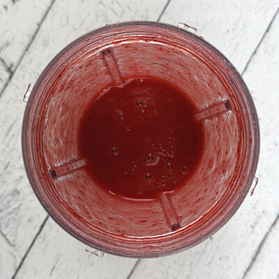 Step 1 - Wash and clean the strawberries and cut them in smaller pieces. Transfer them to a food processor and add the light brown sugar. Pulse until you have strawberry puree.