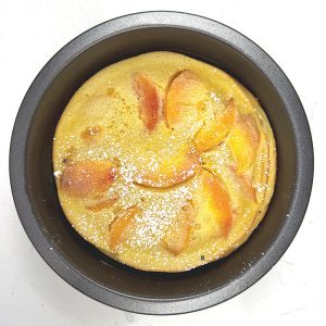 Peaches n Cream Clafouti with powdered sugar