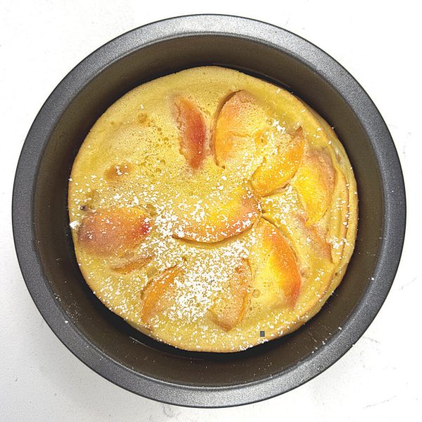 Peaches n Cream Clafouti with powdered sugar