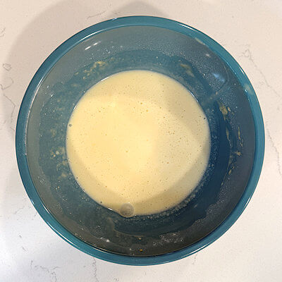 Step 1 - Place flour, part of the sugar, salt, egg and cream in a bowl and mix. Add the milk and mix again.