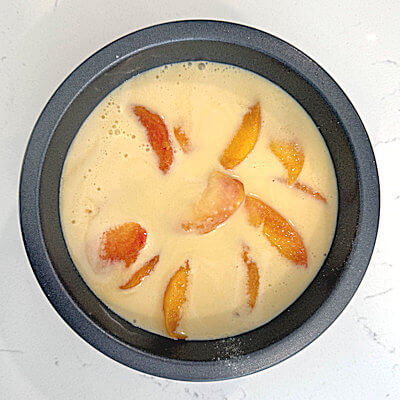Step 4 - Pour the rest of the batter over the fruit. Bake in oven until golden yellow, about 25 minutes.