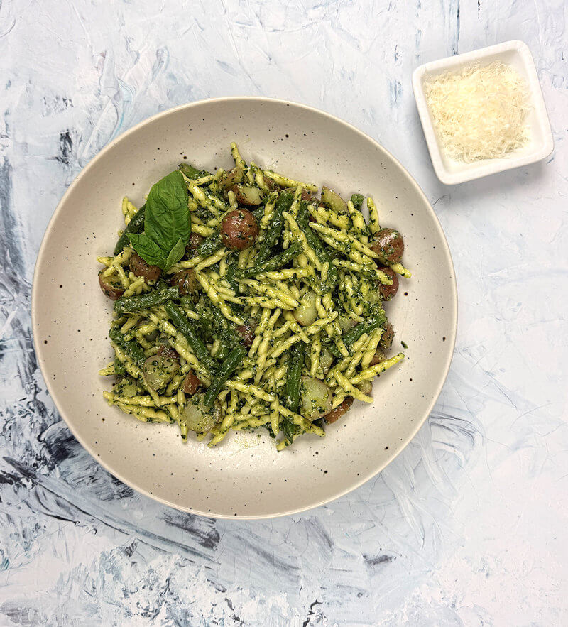 Bowl with Trofie al Pesto Genovese with extra cheese.