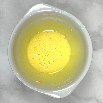 Step 2 - Mix the egg yolk with the sugar and whip until white and creamy.