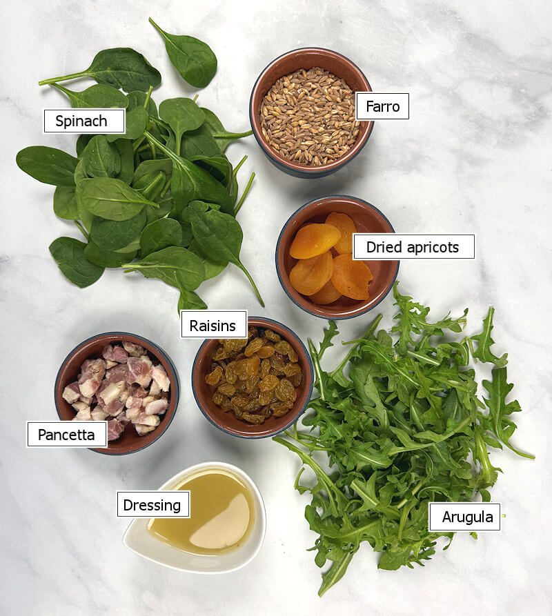 Key ingredients of salad with fruit, grains & greens