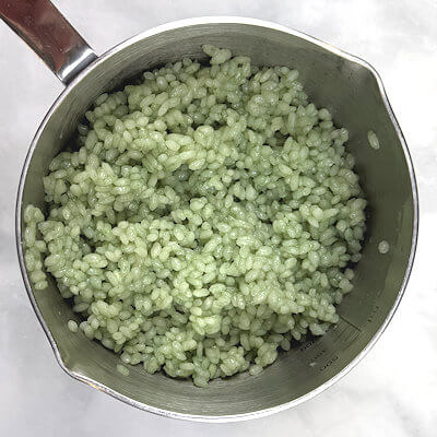 Step 1 - Cook the rice; this will take about 10 minutes to simmer and then a few minutes to rest, but this can vary per brand. Cook the rice with just the right amount of water. Too much water, and you will need to drain it and with that a lot of the green color and flavor will be disappear with the water.