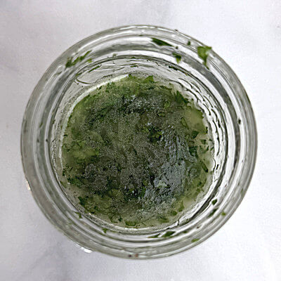 Step 2 - While the rice cooks, mix a simple vinaigrette, from oil, lemon juice, salt & pepper. You don't need any fancy dressing; a variety of flavors and textures are coming from the fruit and vegetables, no need to cover them with a strong dressing. Mix finely chopped cilantro in the dressing.