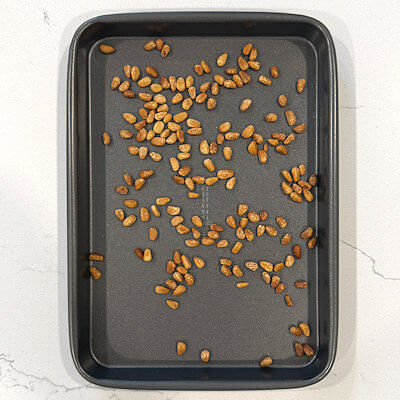 Step 2 - Roast the pine nuts at the same time as cooking the pasta.