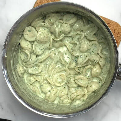 Step 4 - Drain the pasta and keep some pasta water handy. Return pasta to the pan, add the sauce and mix. 