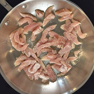Step 3- Heat oil in a skillet and add the turkey tenderloin strips. Sauté few minutes on one side and as soon as you can release the strips from the pan turn them over and cook 1-2 minutes again. Transfer the turkey to a plate and keep warm.