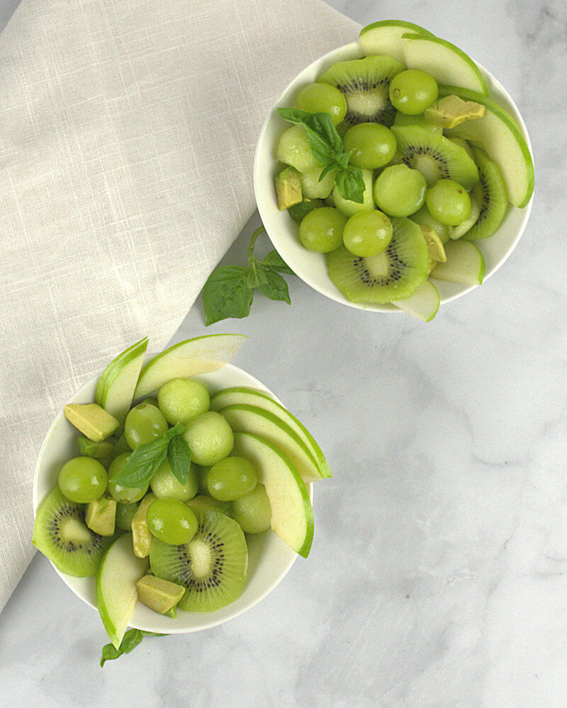 Two bowls with Juicy Green Fruit Salad