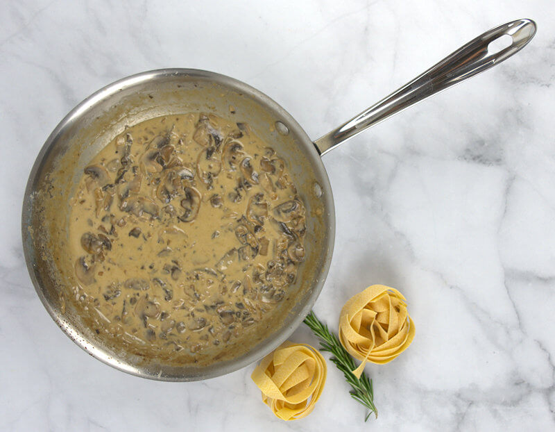 Step 2 - Add the liquids; the cream, white wine (or a chicken or vegetable broth) and a little bit of pasta water. Allow this to simmer and thicken. Inhale the lovely aroma!