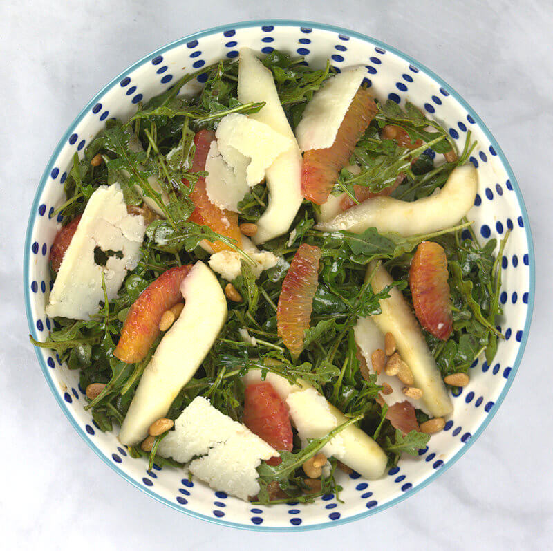 Arugula, Pear & Orange Salad in bowl