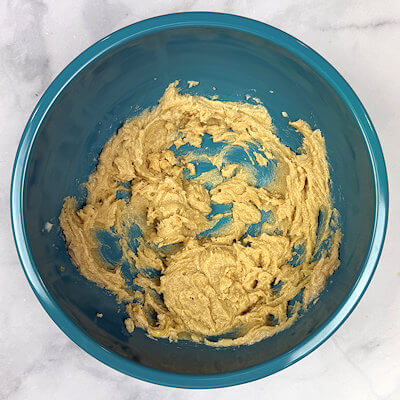Step 2 - Mix butter and sugar. Add the egg yolk and mix again.