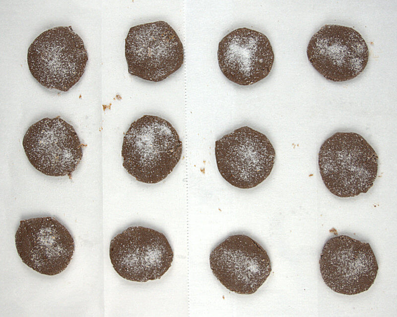 Form cookies, flatten them and sprinkle with granulated sugar