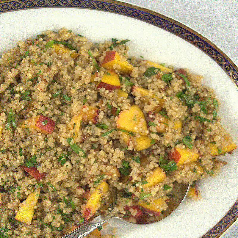 Close up of plate with Quinoa Salad with Peaches & Herbs