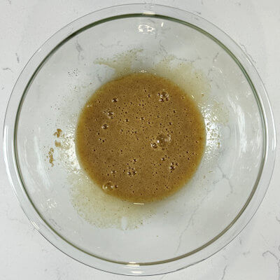Step 3 - In a large bowl mix the cooled brown butter, light brown sugar, egg and vanilla extract.