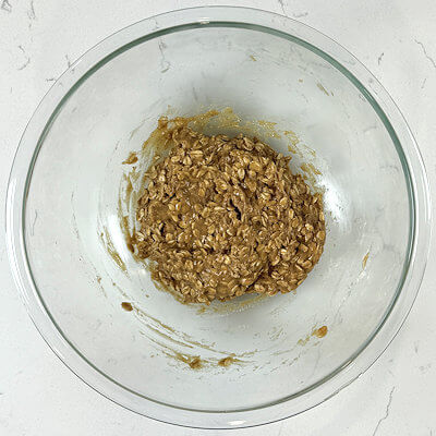 Step 4 - Add the flour - oat mixture to the butter mixture and combine.Place the dough in the fridge for about 10 minutes. This makes it easier to form cookies.