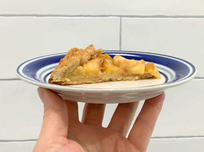 Slice of whole wheat peach galette