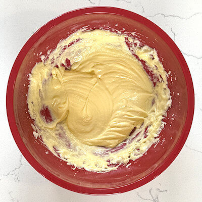 Step 2 - Add the egg to the mixture and beat well. 