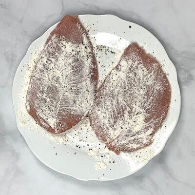Step 1 - Season and flour turkey cutlets.