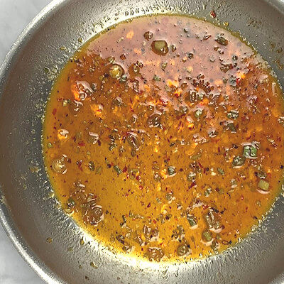 Step 4 - Add jalapeno jelly, red wine vinegar, apple cider and Worcestershire sauce and stir until jelly melts and mixture is warm.