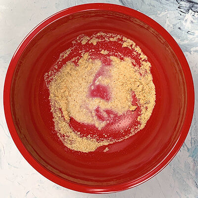 Step 1 - Mix the breadcrumbs with the milk in a bowl.
