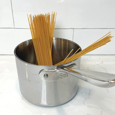 Step 5 - While the meatballs are in the oven, cook the spaghetti according to the directions on the packaging.