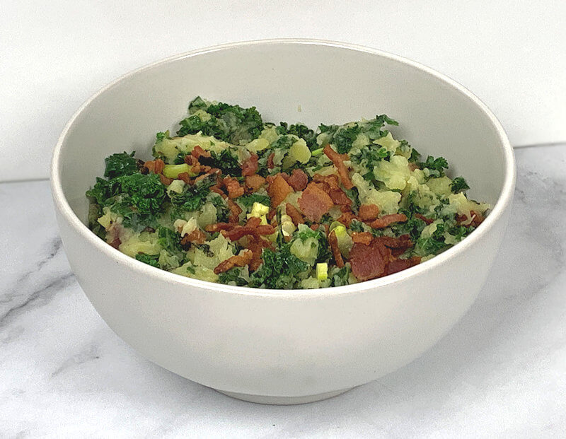 Colcannon with Kale in cream bowl.