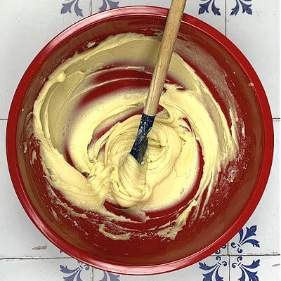 Step 2 - Add egg, vanilla extract and flour and mix again until smooth.