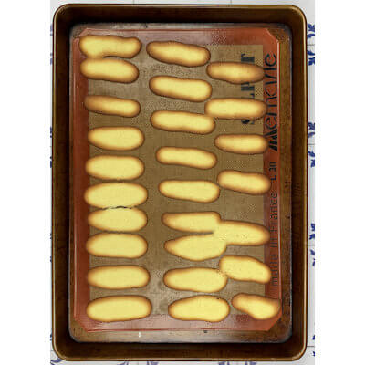 Step 4 - Bake the cat's tongues in an oven of 350 degrees F for about 7-12 minutes. The cookies are done when they are deep brown around the edges, but still have a pale golden color in the middle.