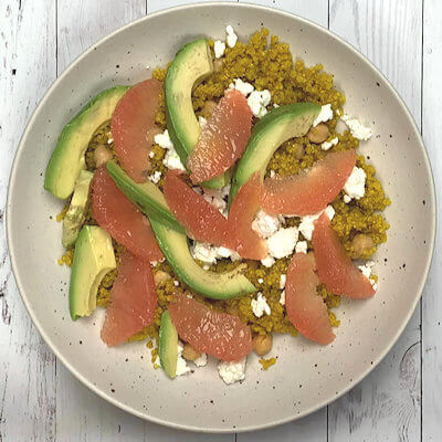 Step 5 - Place the slices of avocado and grapefruit on top of the goat cheese.