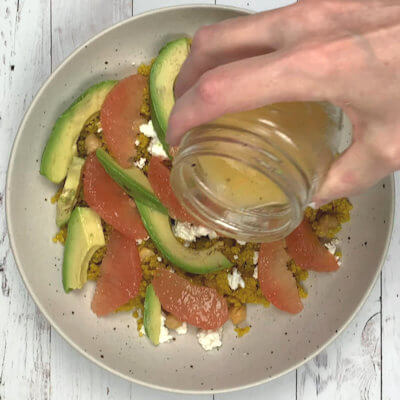 Step 6 - Make a dressing from orange juice, lime juice, grapefruit juice, olive oil and salt & pepper and pour it over the salad.