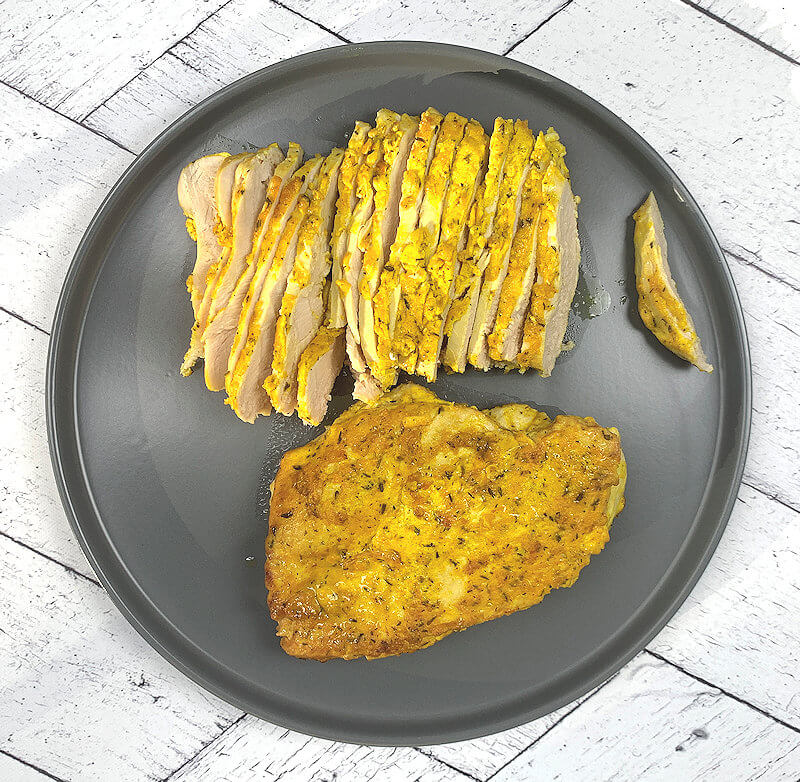 Turmeric-Yogurt Marinated Chicken on a light grey plate