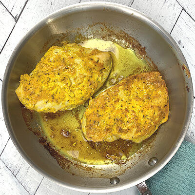 Step 2 - Cook the chicken about 5 to 7 minutes on each side, or until a temperature of 165 degrees F is reached in the thickest part of the meat.