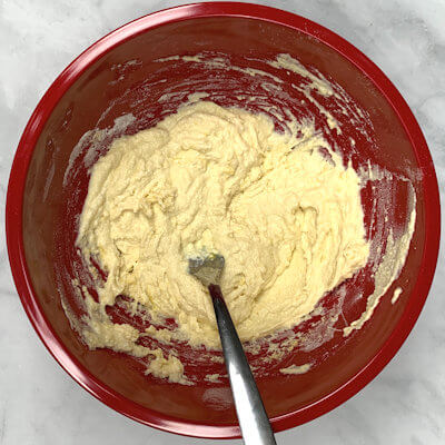 Step 2 - Mix ricotta, flour, egg, egg yolk in a bowl.