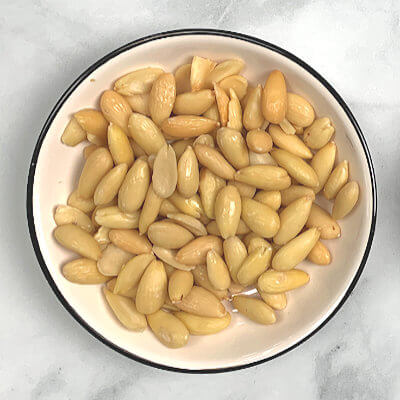 Step 2 - Peel/blanch the almonds. Look here how to do that.
